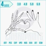Detailed skeleton hands holding a heart embroidery design with dark gothic aesthetic.