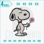 Snoopy holding flower embroidery design stitched on t-shirt.